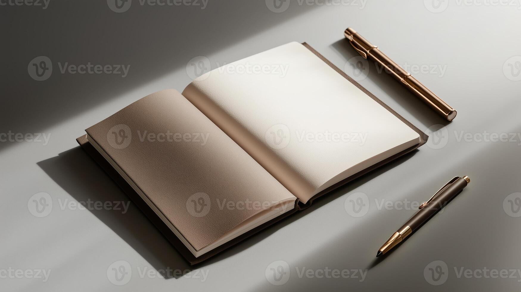 Minimalistic workspace with an open notebook and pen on a clean surface during daylight photo