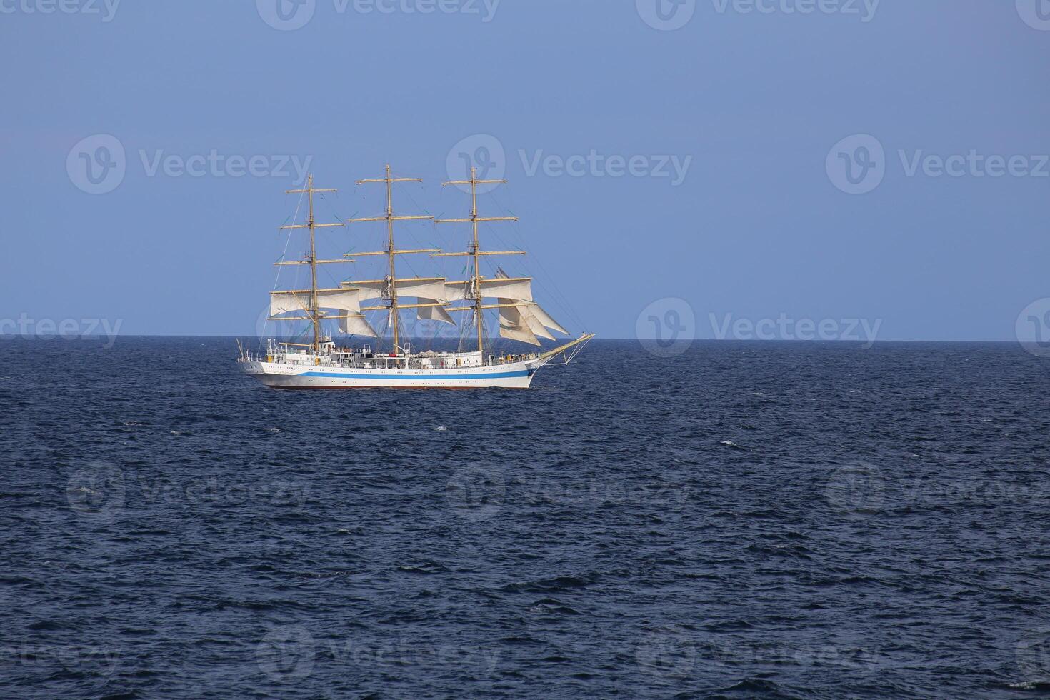 SASSNITZ, GERMANY - SEPTEMBER 15 2015 The sailing ship Mir of the Russian shipping company Rosmorport is sailing on the Baltic Sea near Sassnitz, Germany photo