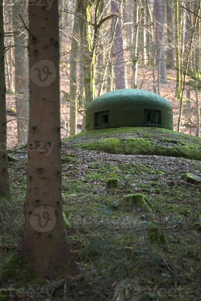 French bunker turret near Langensoultzbach, Vosges, France. It was built before WWII as part of the Maginot Line photo