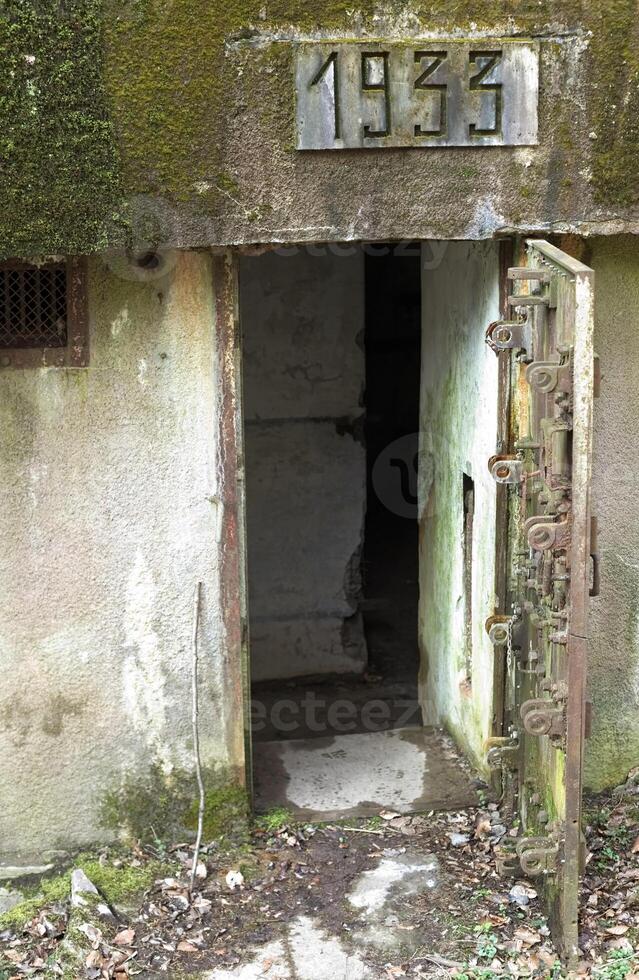 French bunker entrance near Langensoultzbach, Vosges, France. It was built 1933 as part of the Maginot Line photo
