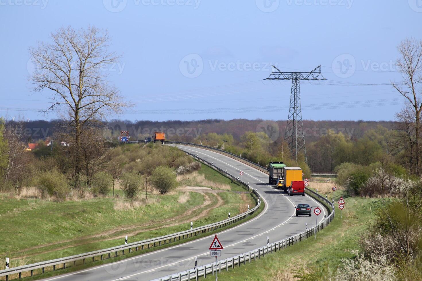 Traffic on a road with construction site in Mecklenburg-Vorpommern, Germany photo