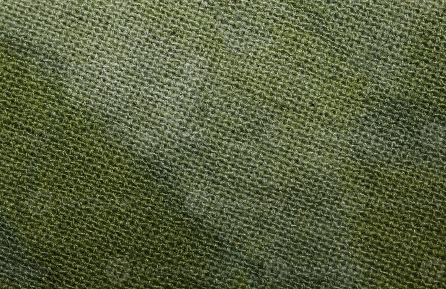 Macro shot of a green cotton textile photo