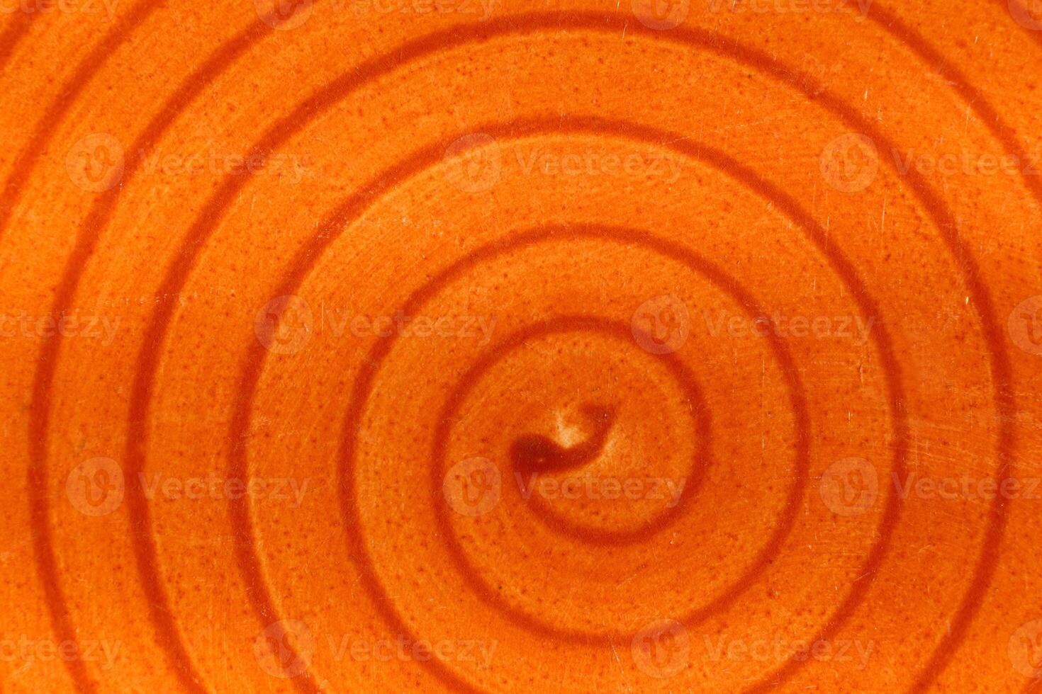 Orange varnish with spiral shape and saturated colors photo