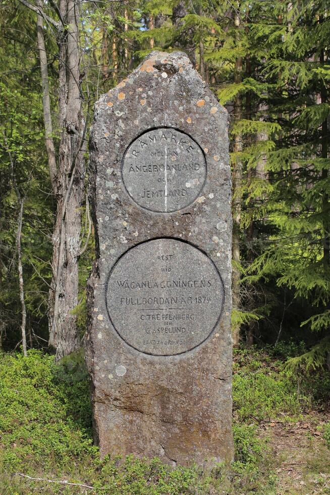 Boundary stone between the historic Swedish provinces Aangermanland and Jemtland photo