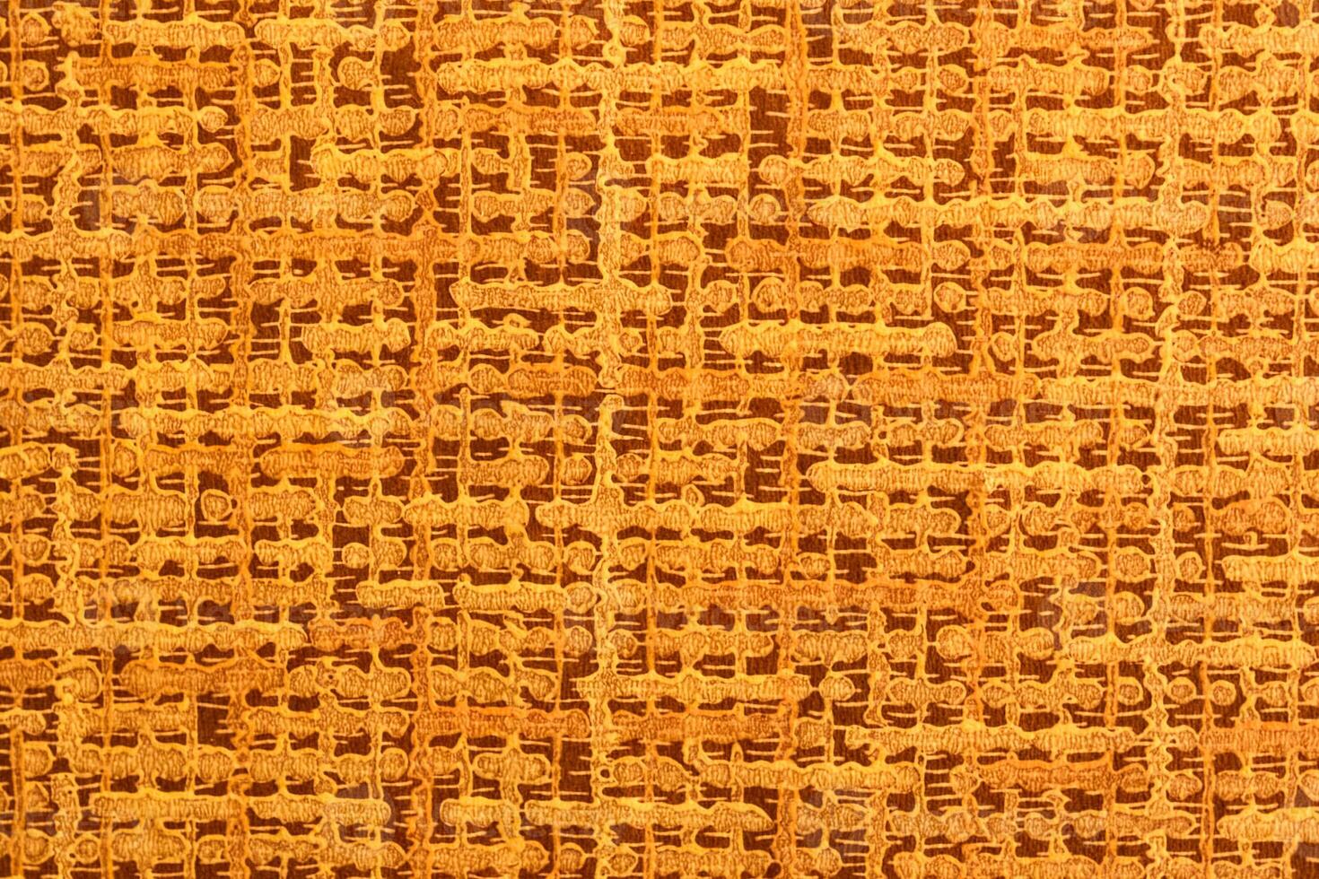 Macro shot of an orange wallpaper pattern photo