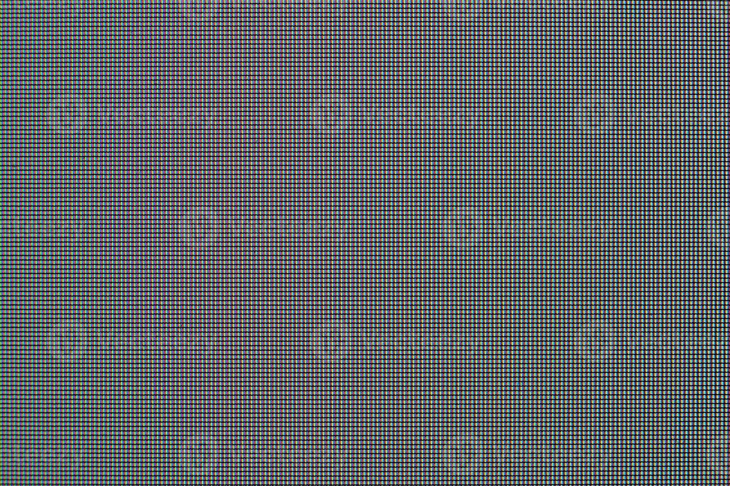 Close up of lcd display with red, green and blue dots photo