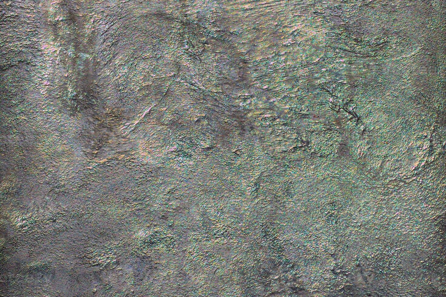 Metal texture with colorful reflections and refractions photo