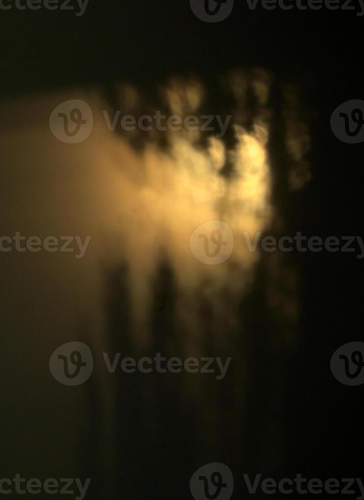 Abstract light effects produced by sunlight and shadow photo