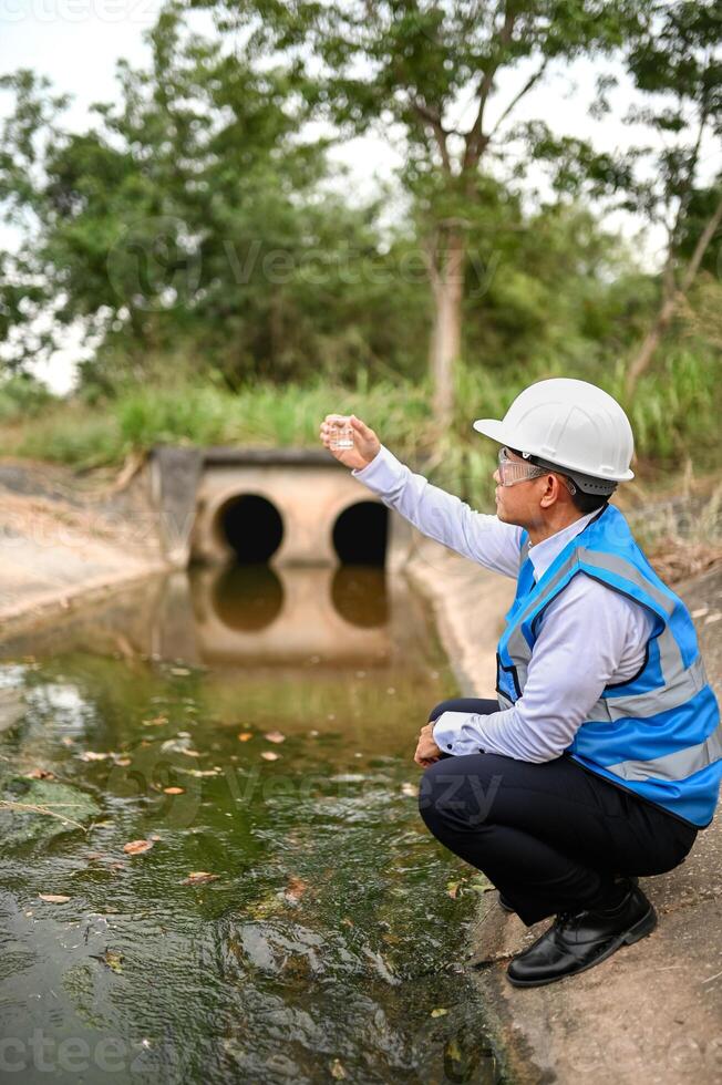 Water resources engineers are examining water samples from community sewers to determine the health of the water source. photo