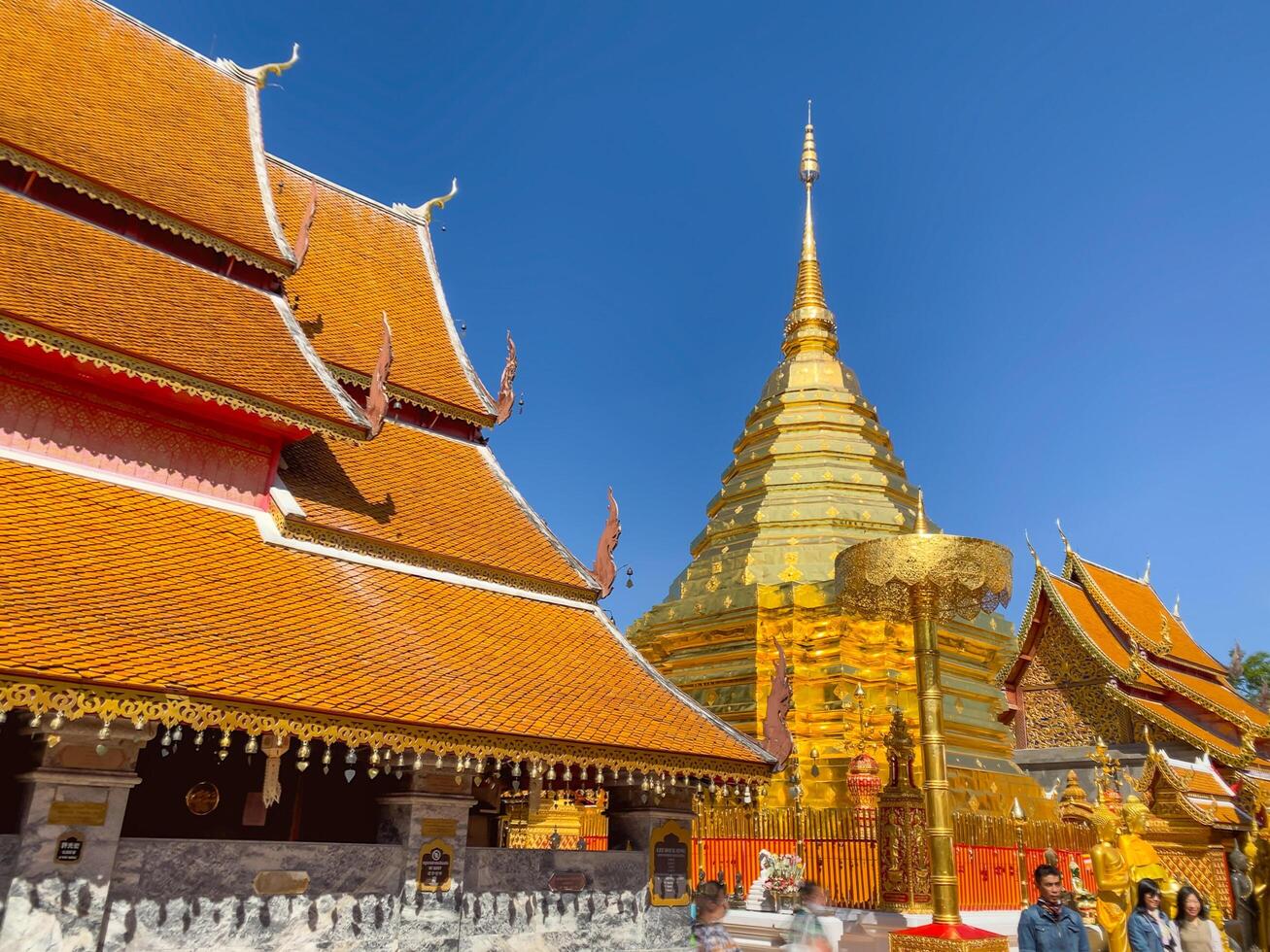 Many people come to pray at the Doi Suthep Temple, The temple founded in 1385 is a major landmark tourist attraction photo