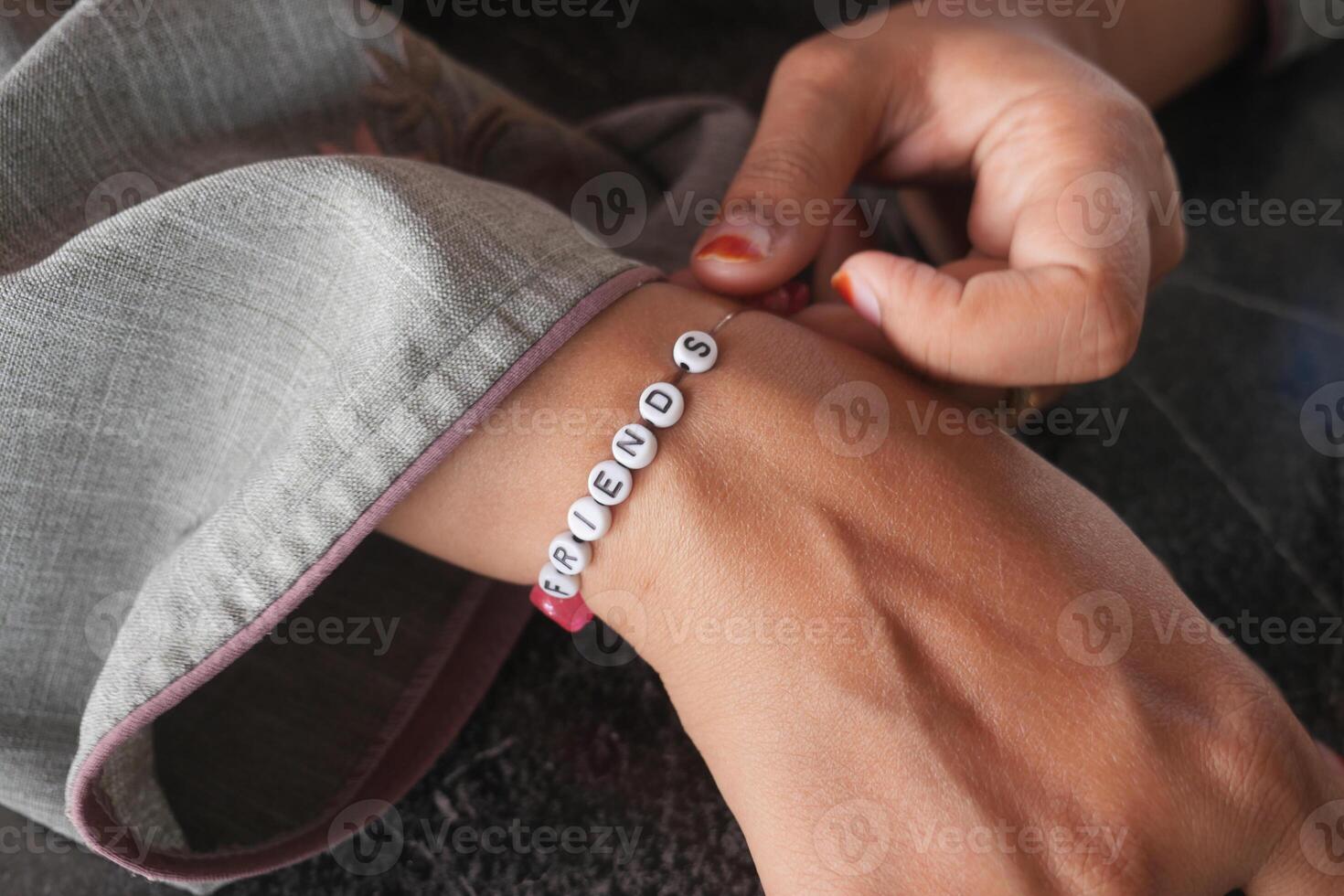 Jeweler bracelet on the female wrist. photo