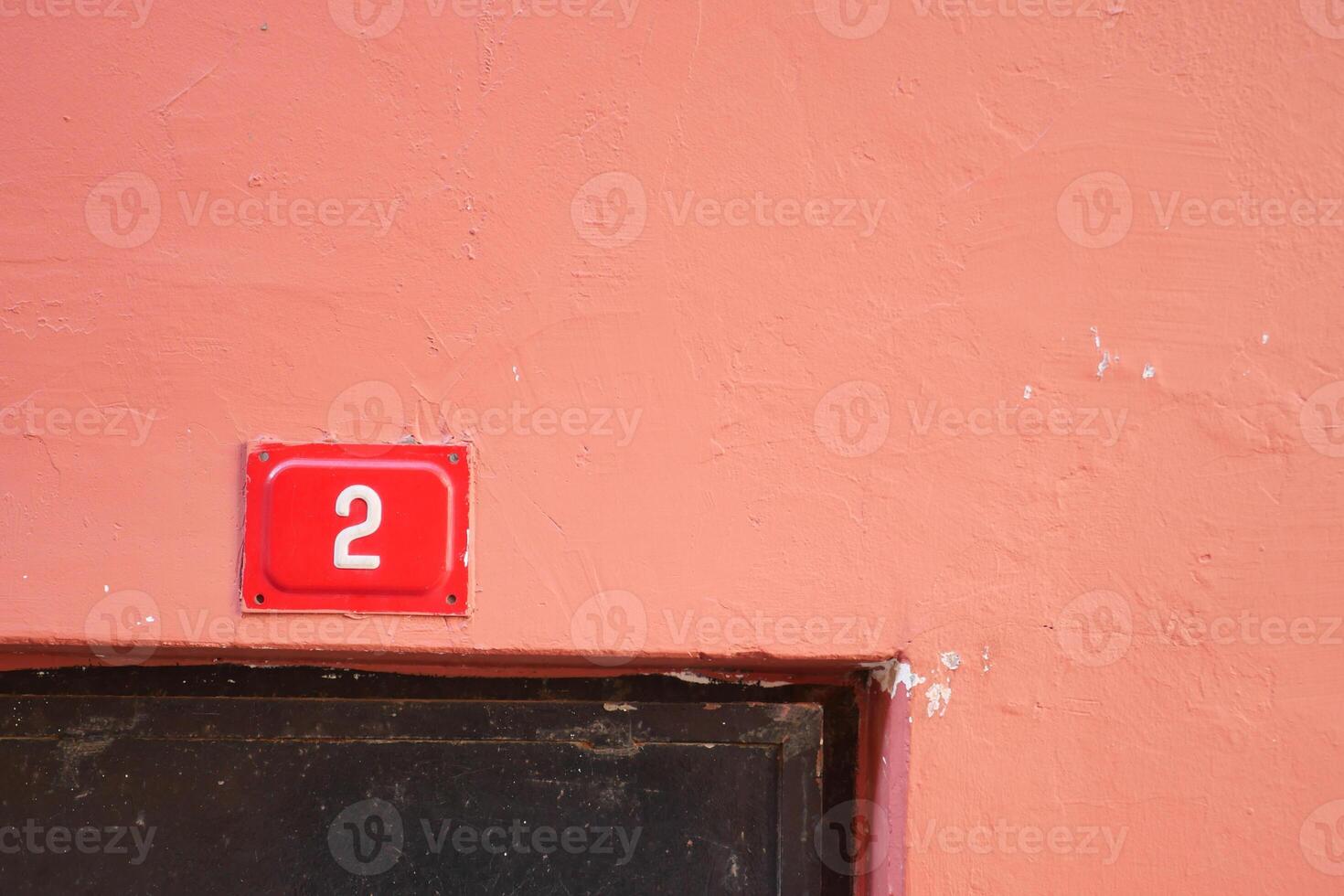 Door Number 2 beautifully placed on an eyecatching Pink Wall photo