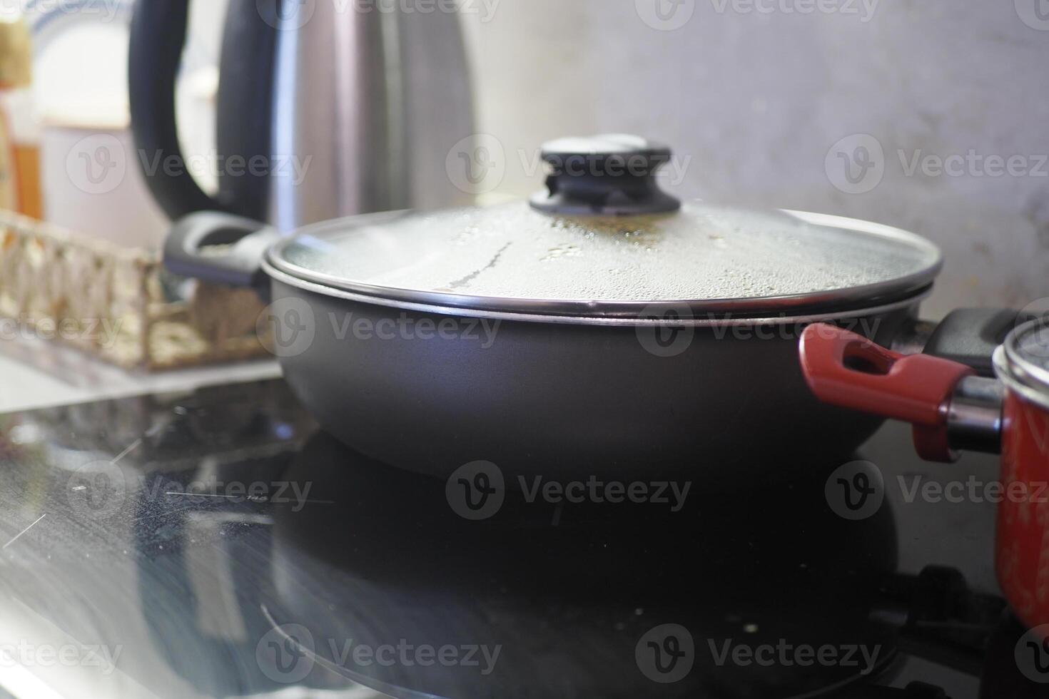 Contemporary Cookware Ideal for Use on the Stovetop within a Kitchen Environment photo