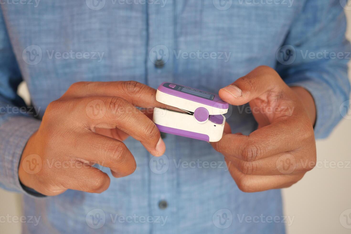 A compact device for monitoring health is conveniently held in your hands photo