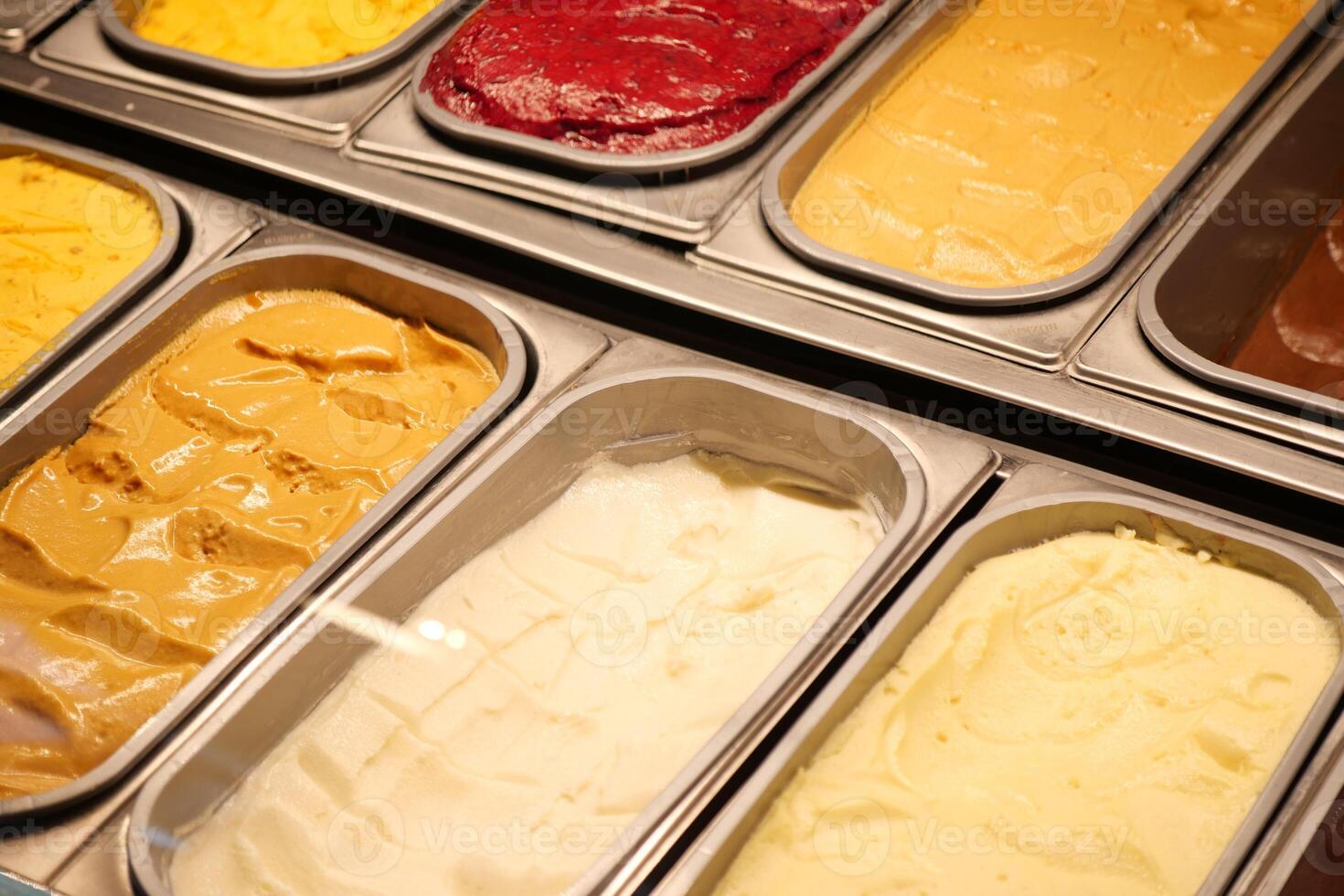 chocolate, vanila and orange favor of ice cream display for sale photo
