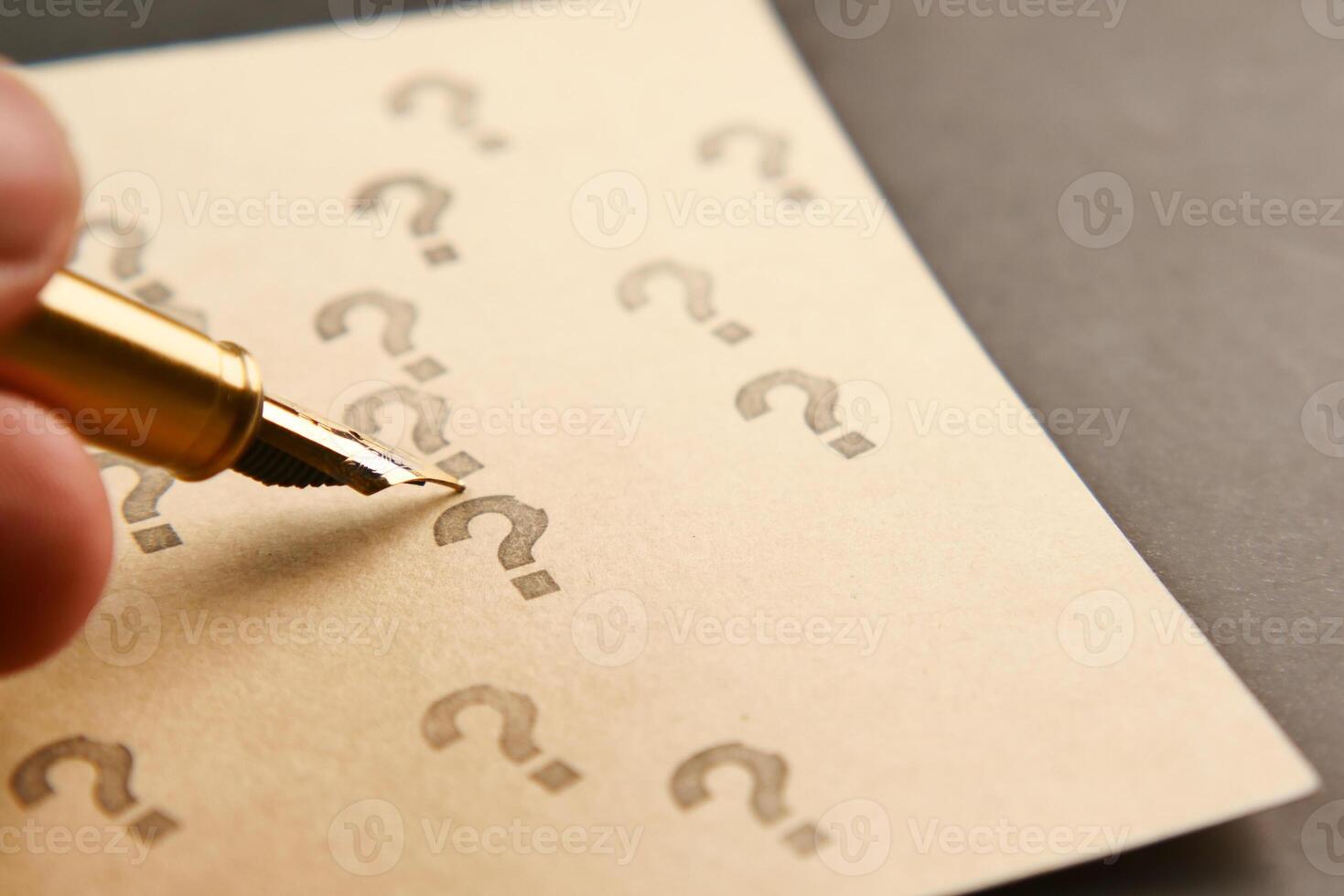 question mark on paper on office desk photo