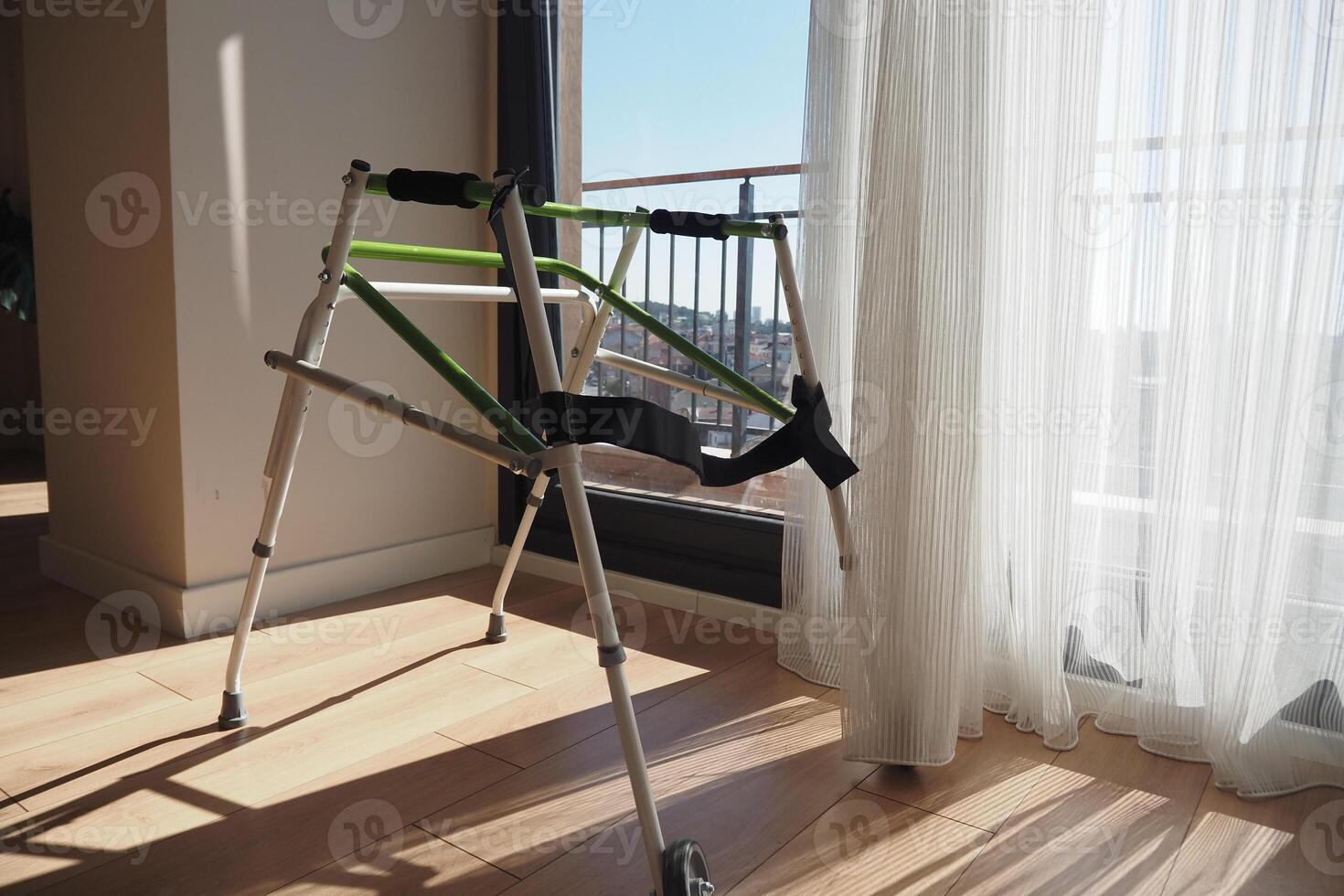 A Stylish Walker Positioned by a Window, Bathed in Natural Sunlight photo