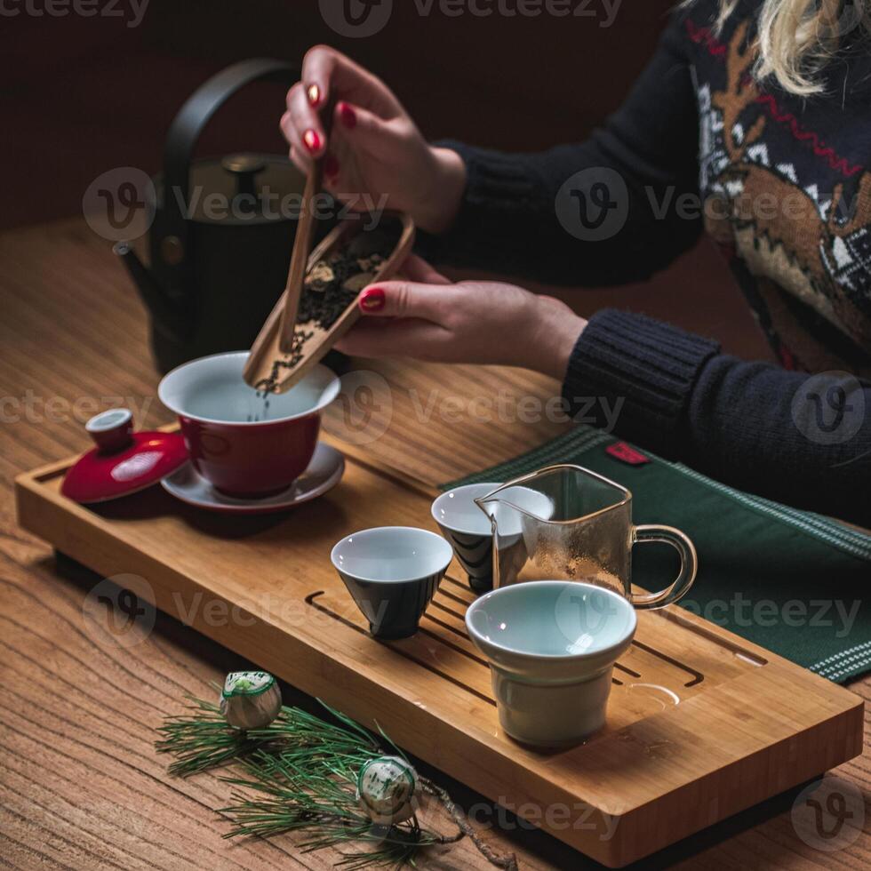 The Artful and Elegant Preparation of Tea Emphasizes the Use of Beautiful Traditional Teaware photo