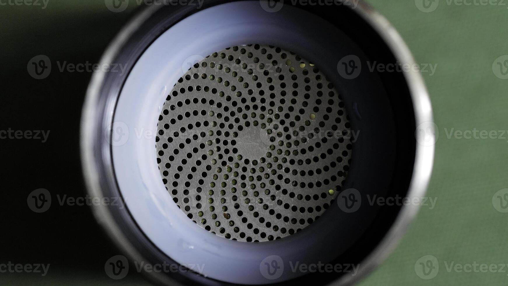 An Intricate Spiral Design that is Featured in a Modern Speakers Mesh Surface Texture photo