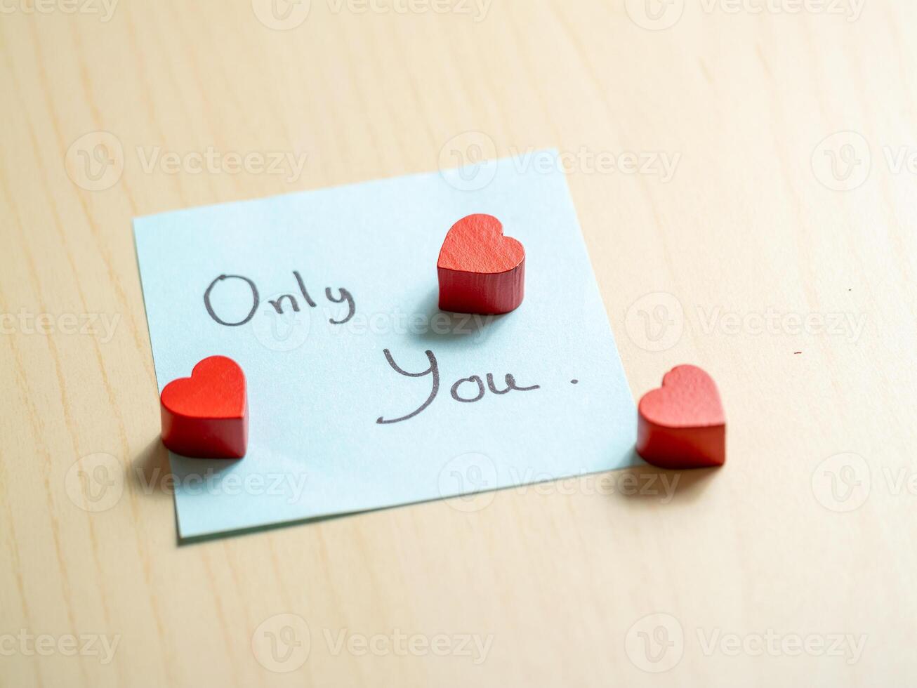 Romantic gesture with hearts home greeting card intimate setting close-up love concept photo