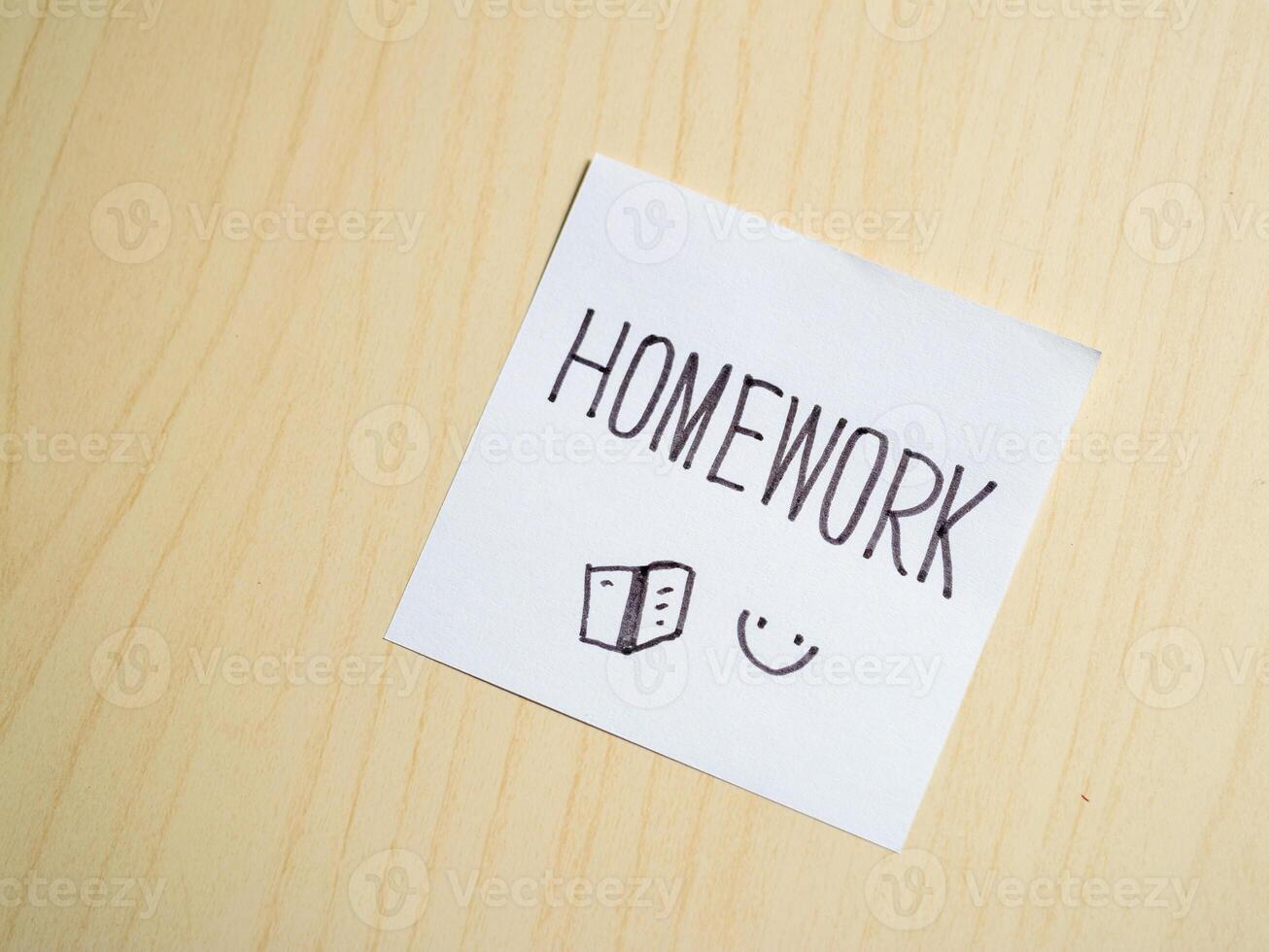 Homework reminder note study space productivity tool minimalist setup close-up organization tips photo
