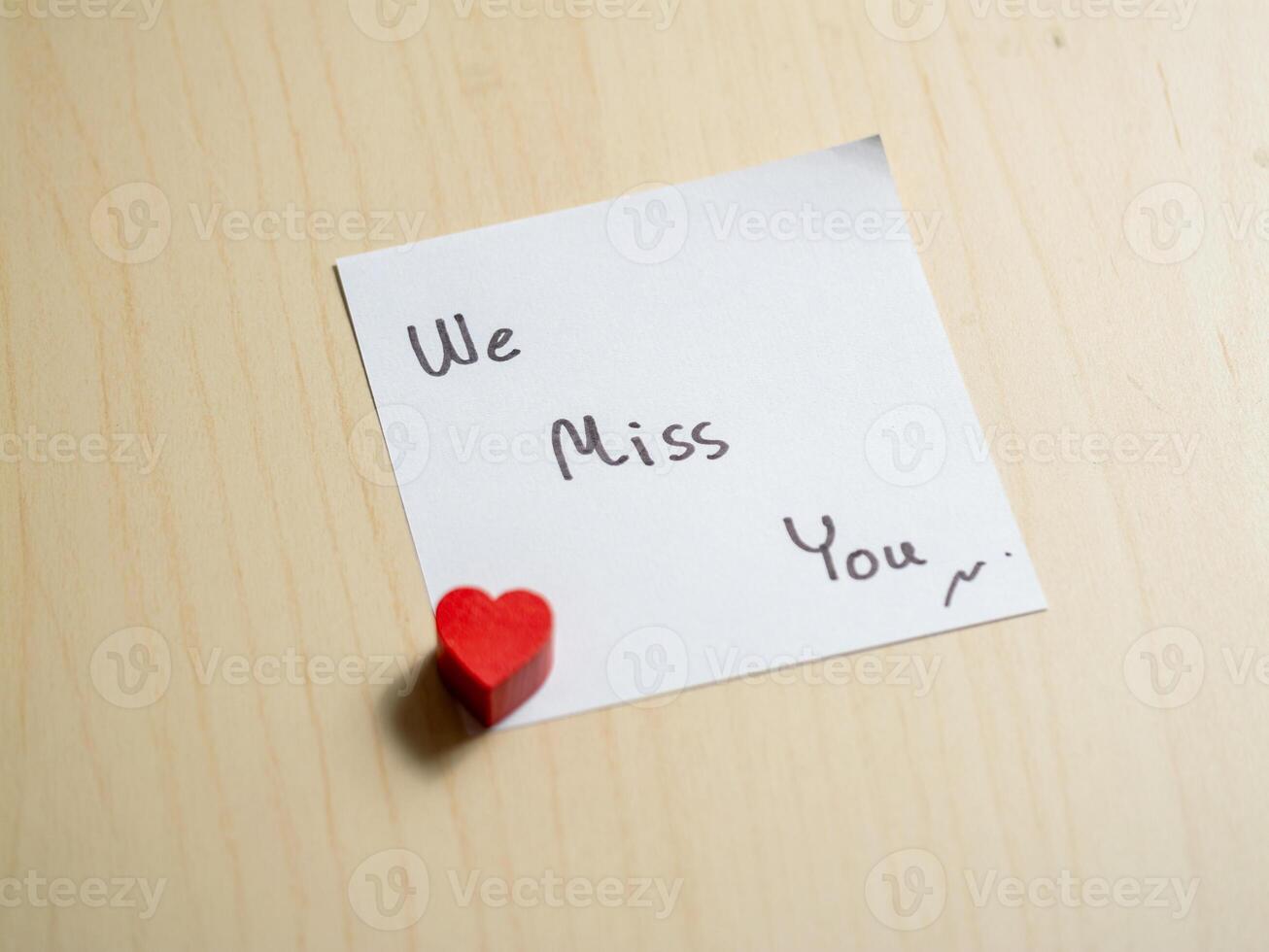 Heartfelt message of longing home note indoor close-up emotional connection photo