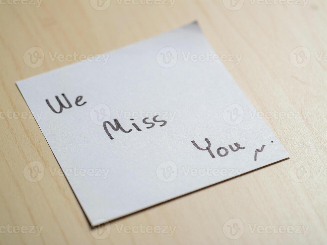 Close-up of sentimental farewell note at home table an emotional connection photo