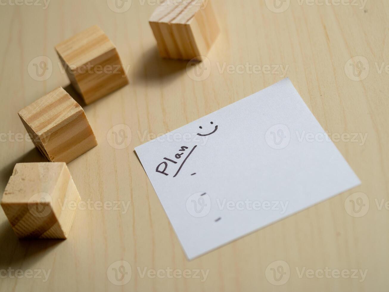 Boost productivity in a minimalist home office with wooden blocks for task organization photo