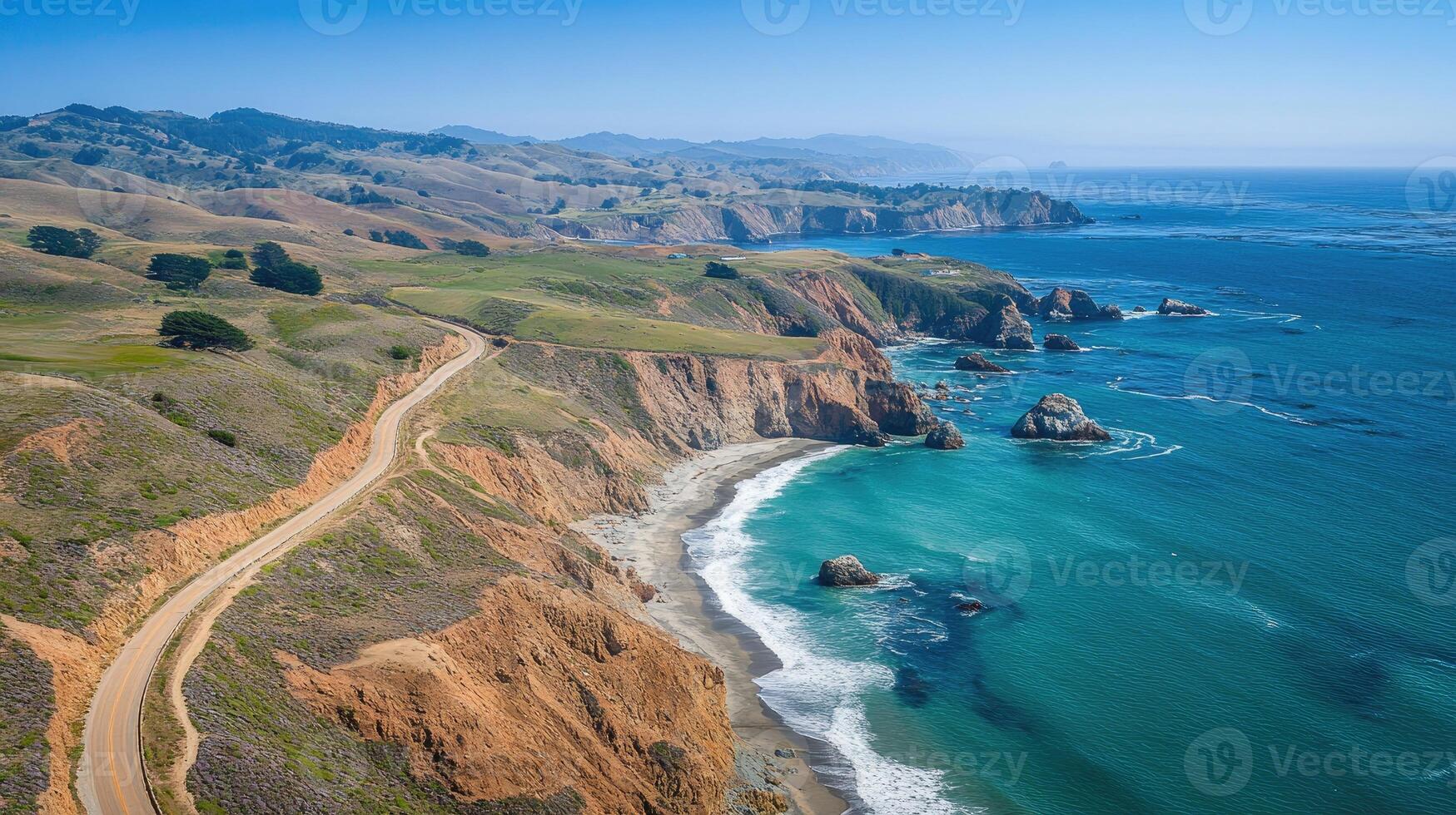 Highway 1 winding along the scenic california coastline on a sunny day photo