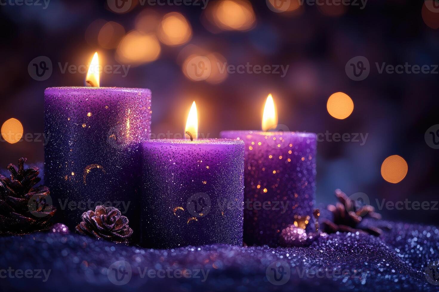 Five purple advent candles burning with christmas ornaments and pine cones in snow photo