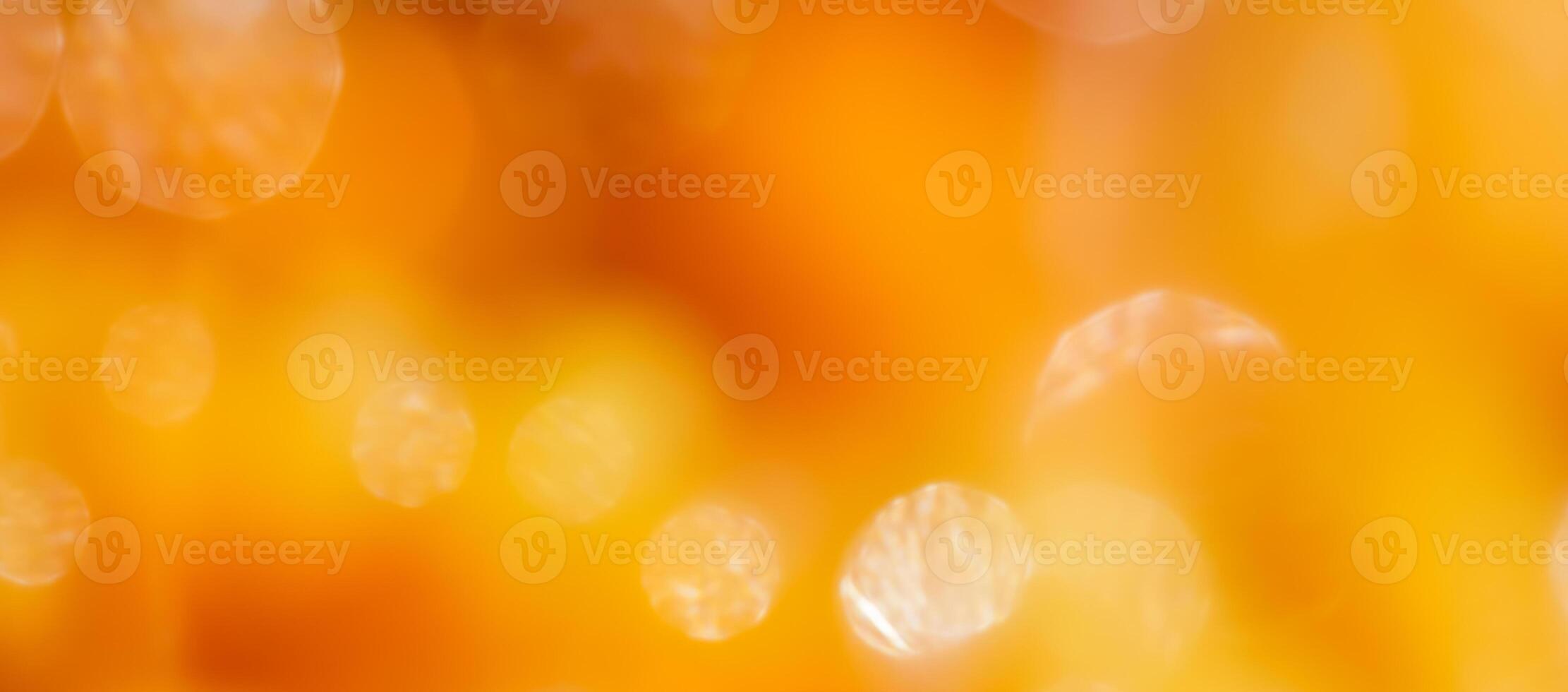 Bright colors amber, sunny light shining background, blurred the light of the bokeh shines photo