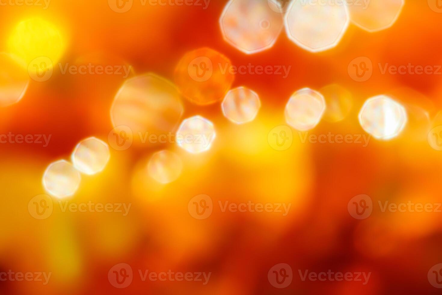 Bright colors amber, sunny light shining background, blurred the light of the bokeh shines photo