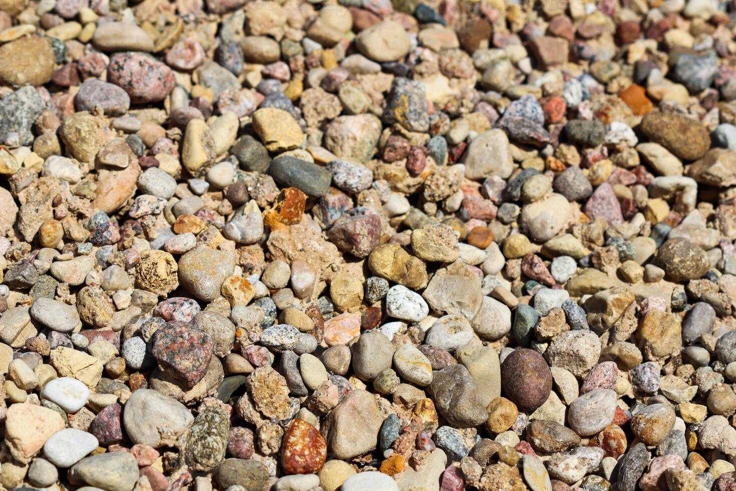 Various gravel pile for background. Sharp closeup stones for construction. Rubble texture photo