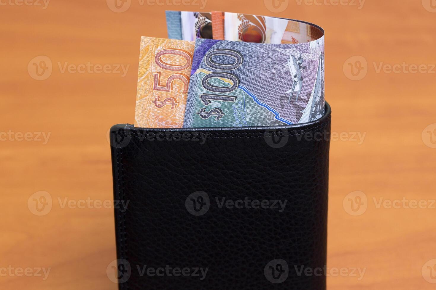 Barbadian dollar in the black wallet photo