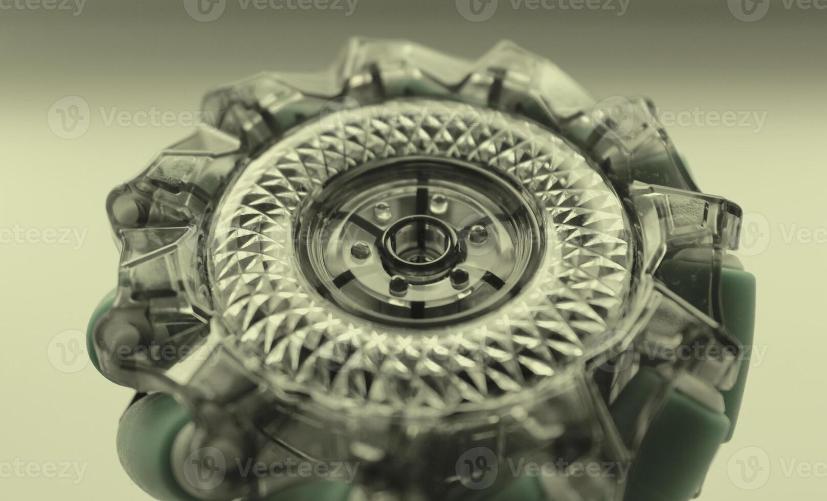 Round Mechanical Part With Translucent Elements Isolated Stock Photo. Concept Image Of Mechanical Background photo