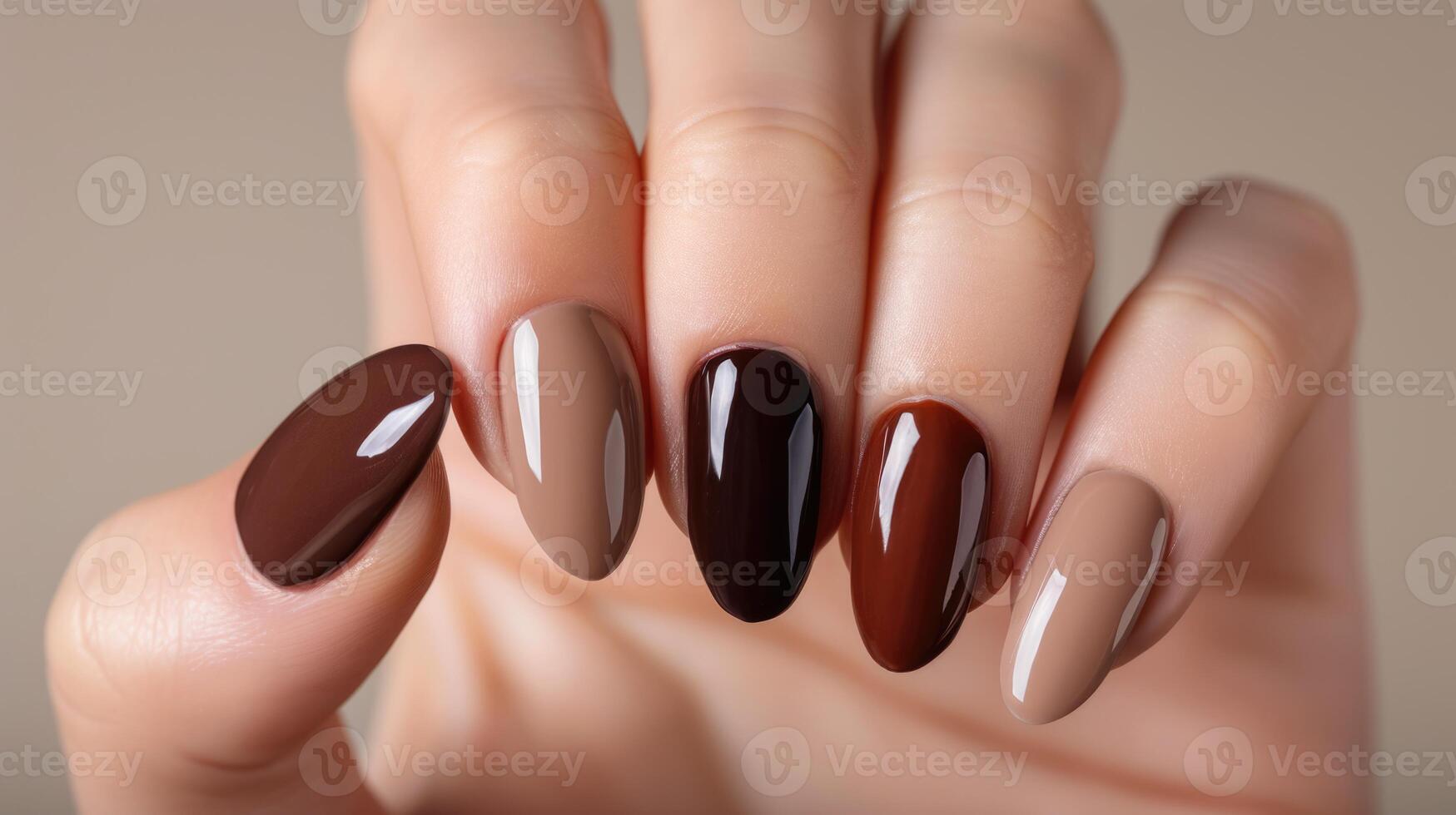 Photos of the design of multicolored nails on the hands , advertising the color of nails