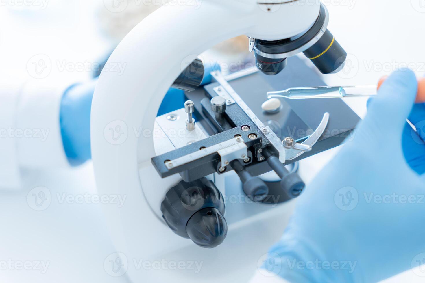 Scientist analyze biochemical samples in advanced scientific laboratory. Medical professional use microscope look microbiological developmental of viral. Biotechnology research in science lab. photo