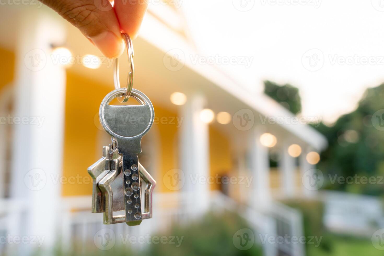 lease, rental and selling home. Real estate agent hold key for new house or real estate. rent house, Sales, loan credit financial, insurance, Seller, dealer, installment, buy, sell, move in photo