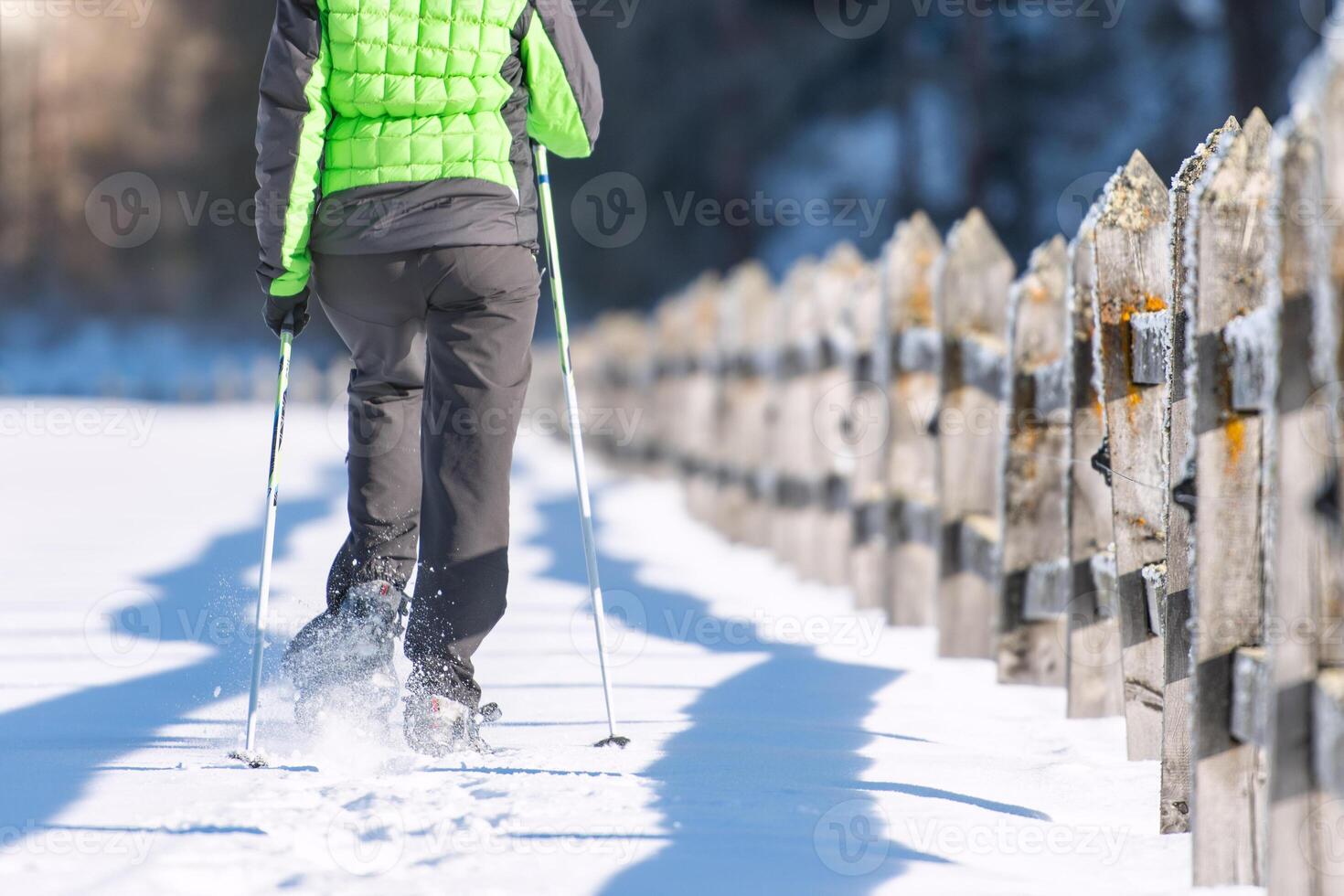 Walking with snowshoes photo