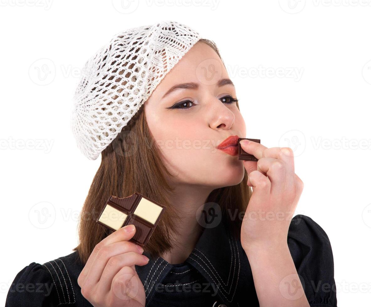 Young cute brunette girl love with chocolate photo