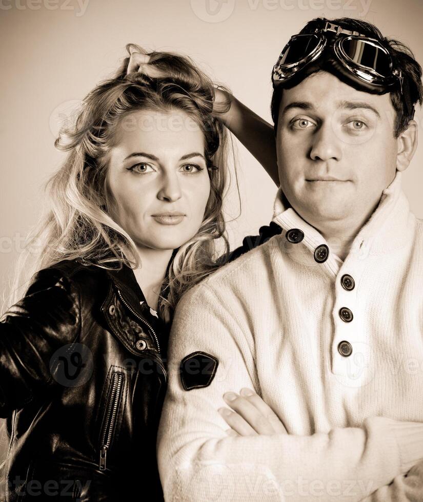 Young couple in retro style clothes photo
