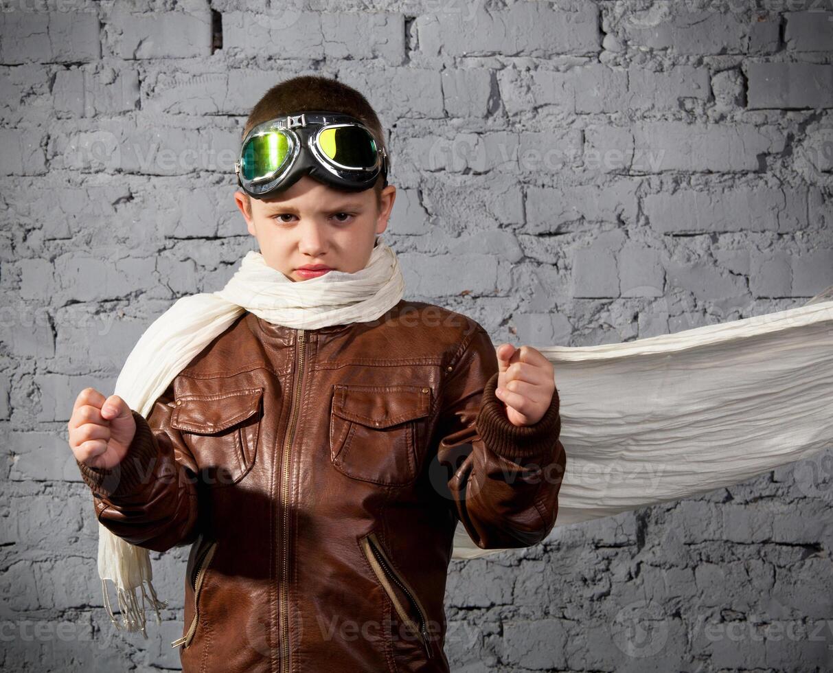 Little boy dreaming of becoming a pilot photo