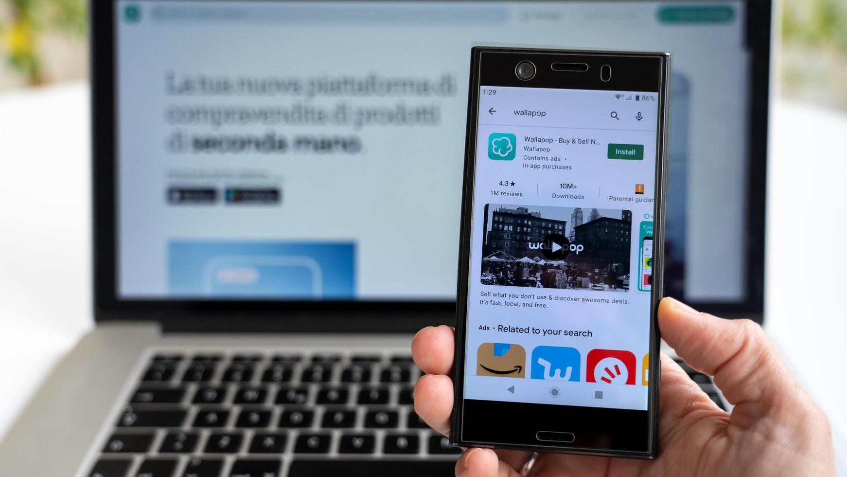 Milan, Italy 11 16 2021 Installing Wallapop app for smartphone. photo