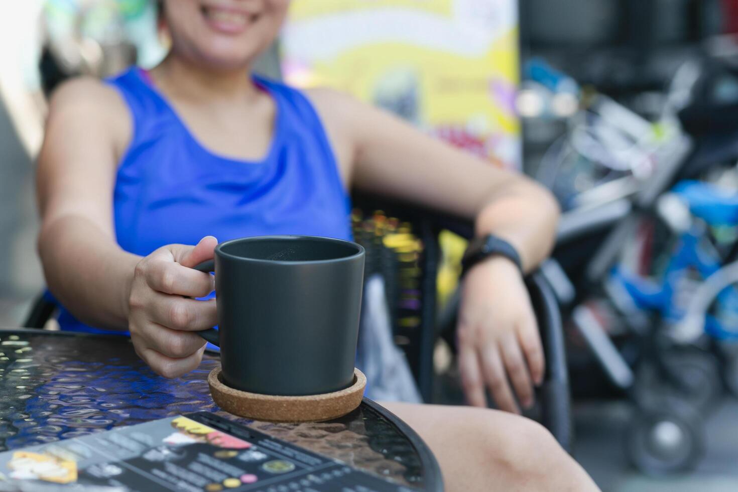 Happy woman drinking coffee in the morning. photo