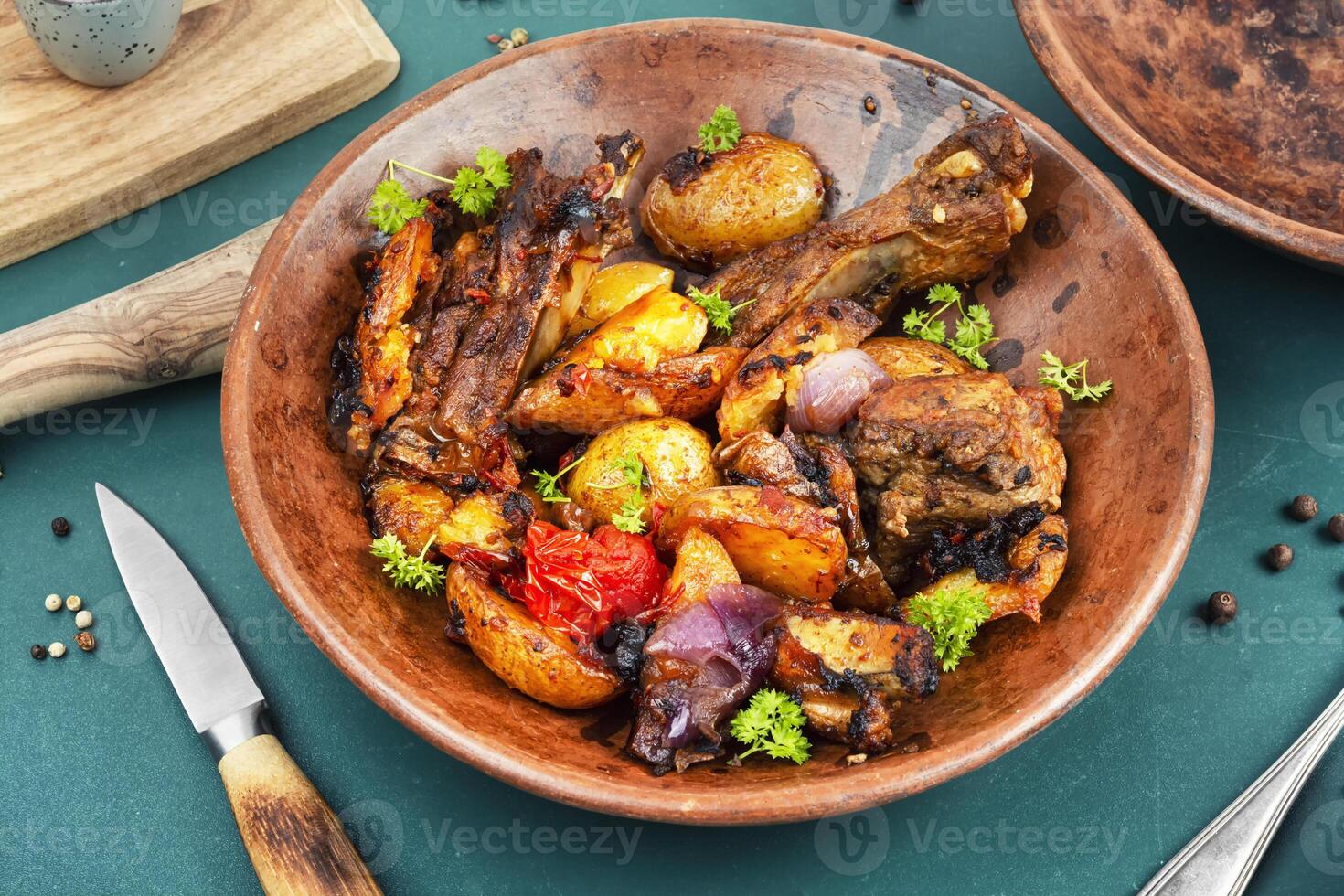 Grilled meat ribs with fried potato. photo