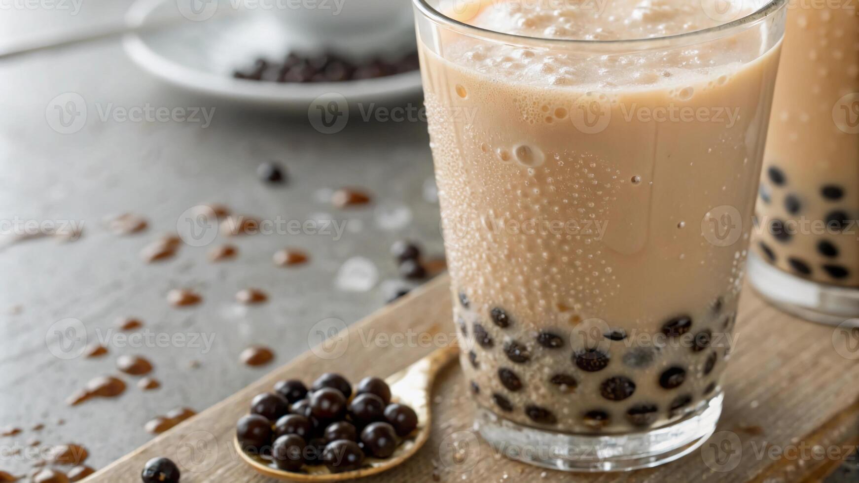 Two glasses of bubble tea with black beans photo
