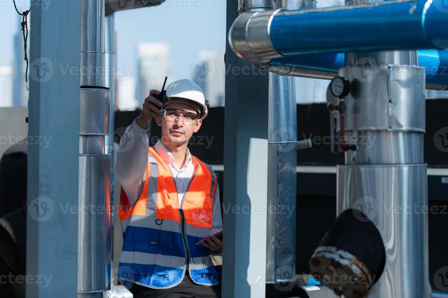 Engineers inspect the completed air conditioning and water systems to continue verifying their functionality. photo
