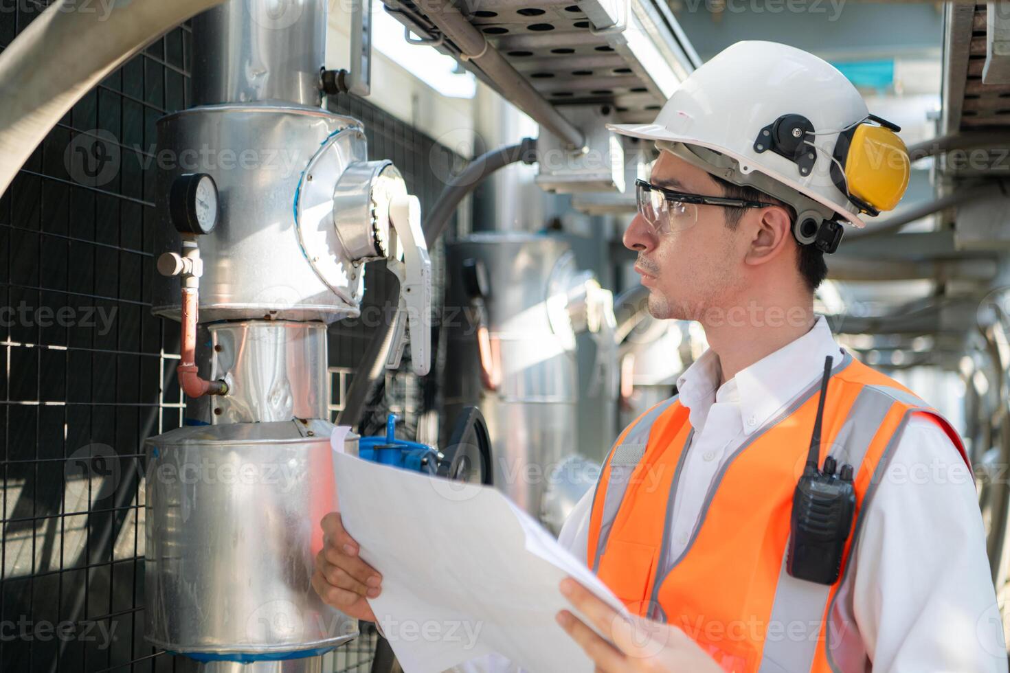 Engineers inspect the completed air conditioning and water systems to continue verifying their functionality. photo