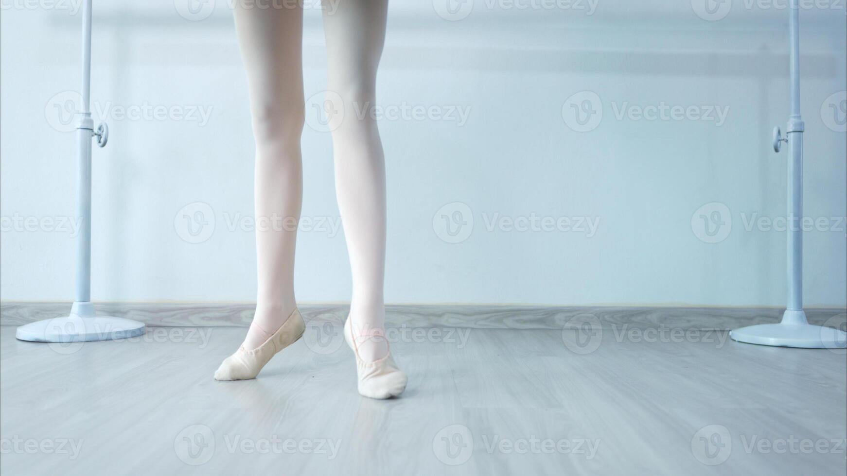 The rhythm of the legs and feet of ballet student practices ballet dancing photo