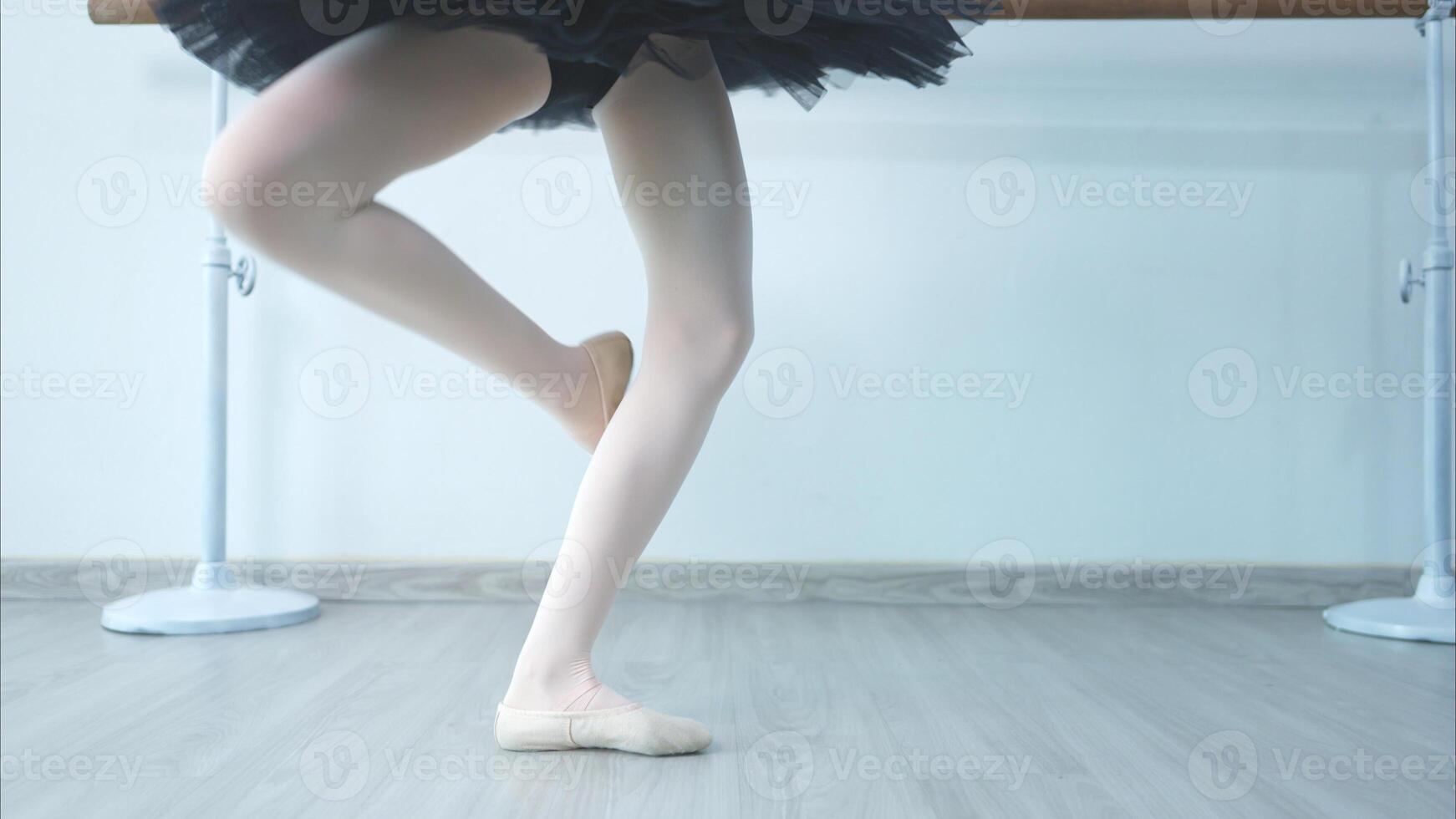 The rhythm of the legs and feet of ballet student practices ballet dancing photo